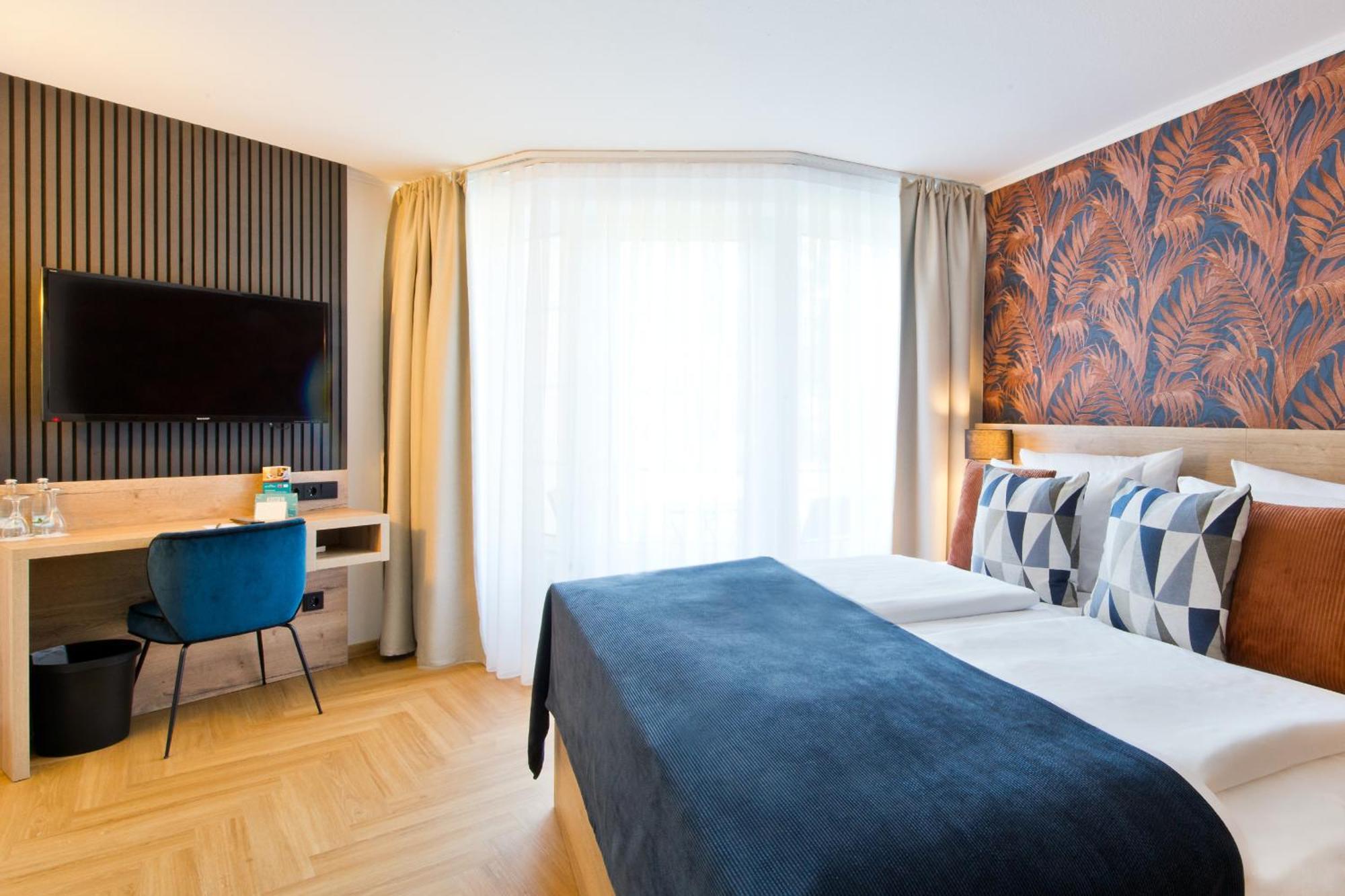 โรงแรมเอเทรียม อะมาดิอุส Osterfeld ห้อง รูปภาพ